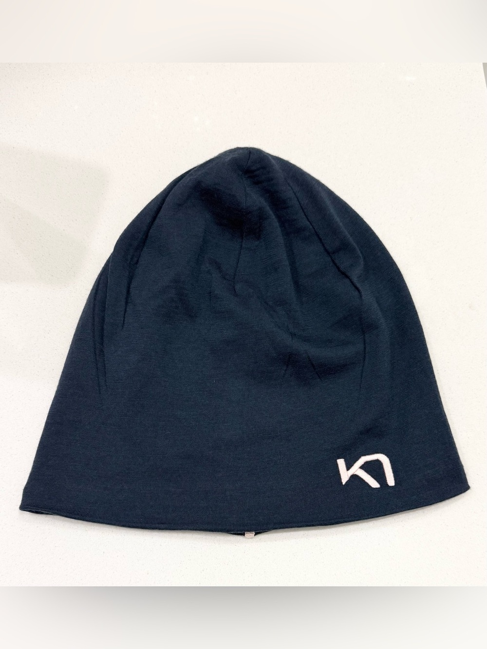KARI TRAA Tikse Beanie in Dark Navy with Pink Colorway